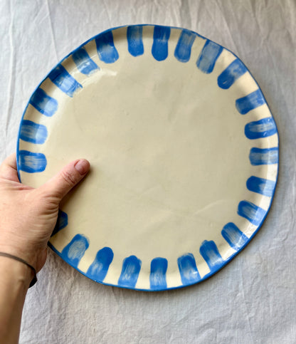 Plat de présentation : tarte, plateau de fromage, planche apéro...