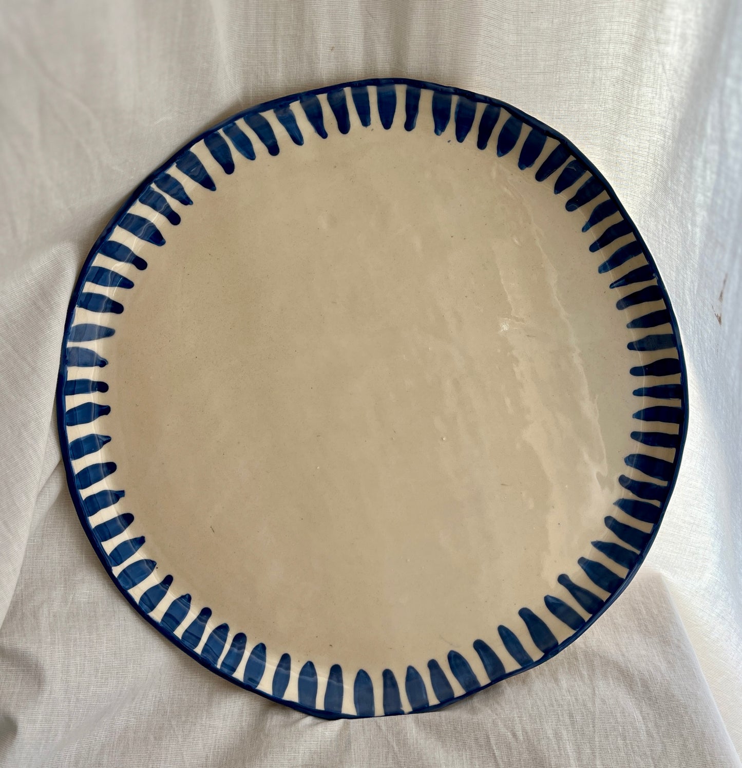 Plat de présentation : tarte, plateau de fromage, planche apéro...